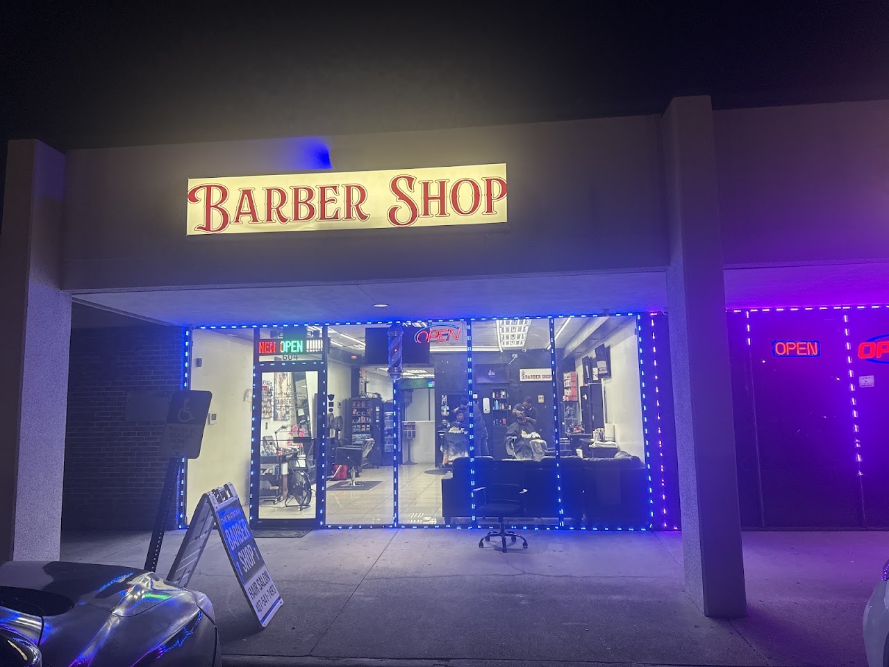 New Barbershop 2 storefront at night